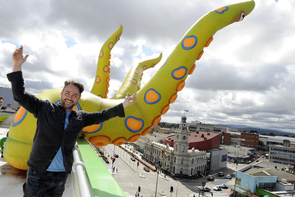 Artist Felipe Reynolds with the tentacles atop the Dandenong Civic Centre for the Greater Dandenong Children's Festival. 158691
