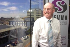 Business boss steps down