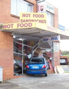Car ploughs into shop