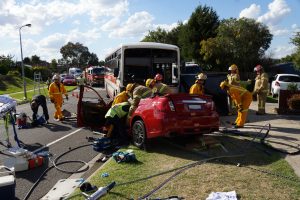 Bus-car collision: driver critical, passenger serious