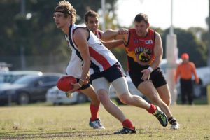 Districts downed in top-spot battle