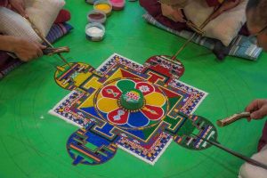 Monks create sand designs