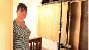 Thick wall saves woman as car heads into Dandenong North bedroom
