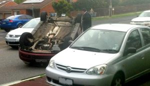 Miraculous escape after car flips in busy Dandenong street