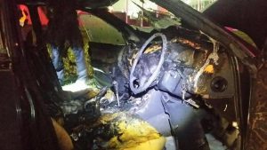 Man pulled from burning car