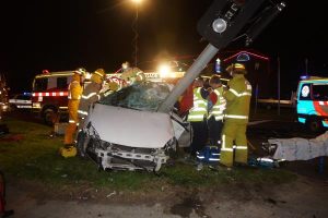 Passenger critical after traffic light smash
