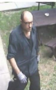 Man left cuffed by fake policeman