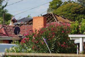 Roof siege comes to end