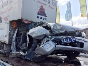 Driver in hospital after traffic-light crash