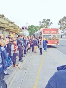 Rail commuters line up to wait