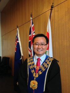 Tak triumphs in mayoral battle