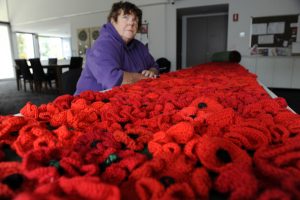 Pillars of Freedom steps adorned with poppies