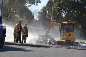 Rubbish fire in garbage truck