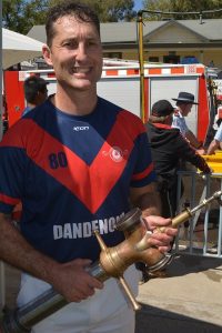 A volunteer with runs on the board