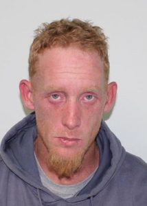 Still wanted by police