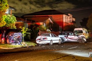 Car slams into parked cars