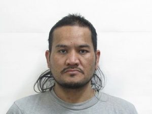Heng wanted by police