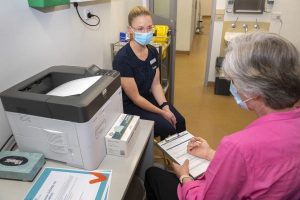 Nurse’s Covid jab a ‘relief’