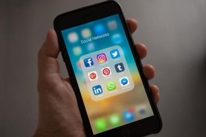 Six charged with fake-telco scam