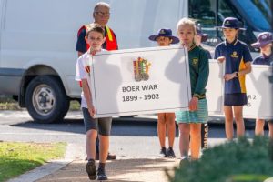 Young pay respects to the fallen