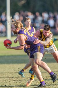 Hawks hang on in thrilling finish