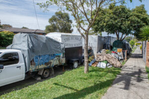 Council cleans out accused hoarder’s yard