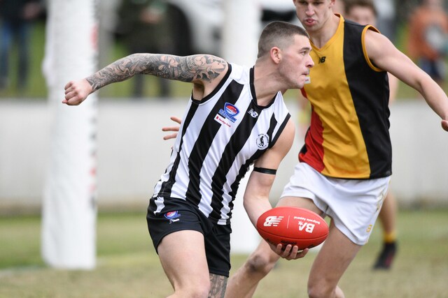 Magpies fly home with upset victory