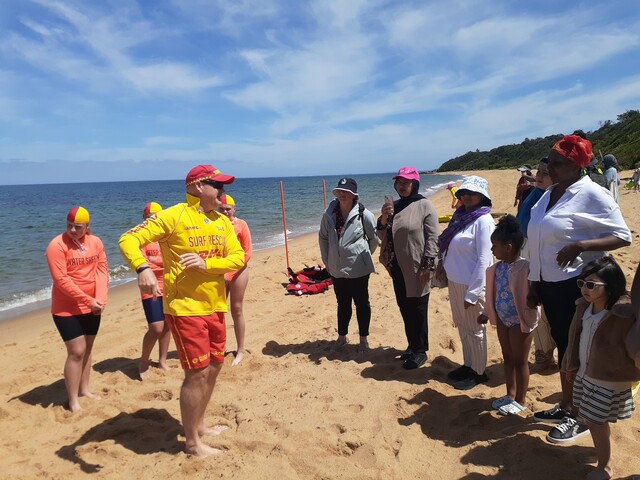 Between the flags: new-arrivals get tips on water-safety